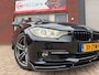 BMW 3-Serie Touring 320i Upgrade Edition / Carplay / Leder / M / Navi / PDC / Xenon / NAP