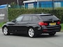 BMW 3-Serie Touring 320i High Executive NAP/HEAD-UP/LEER/NAV