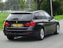 BMW 3-Serie Touring 320i High Executive NAP/HEAD-UP/LEER/NAV