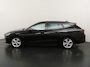 SEAT Leon Sportstourer 1.5 TSI e-Hybrid 204pk FR Business | PHEV | Trekhaak | SOH 101,4% | Stoel- en stuurwiel verwarming | Adapt. Cruise | Camera | 1/2 leer | Fabrieksgarantie t/m 05-2028 |