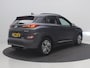 Hyundai Kona Electric EV Premium 64 kWh / Navigatie/ Warmtepomp / 3-Fase / Lederen bekleding / SoH 99,4% / Trekhaak / Lederen bekleding / 481 km WLTP/