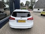 Ford Focus Wagon 1.0 EcoBoost Hybrid 155 PK Titanium X Business | Wegklapbare Trekhaak | Electrische Kofferklep | | Stuur & Stoelverwarming | Navigatie | Apple Carplay | Keyless entry | Lichtmetaal | Parkeersensoren | Cruise Control | Climatie Control | Camera