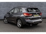 BMW X1 xDrive25e High Executive | M-Sport | Plug-in Hybrid (PHEV) | Panoramadak | LED Koplampen Adaptief | Cruise Control Adaptief | Achteruitrijcamera | Parkeerassistent | Head-up Display | Sportstoelen | Keyless Entry | Elektrische Achterklep | Navigatie