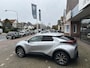 Toyota C-HR / C-HR+ 2.0 Plug-in Hybrid 220 Dynamic dodehoekdetectie / stoelverwarming / stuurwielverwarming / parkeersensoren voor + achter / Navigatie / Apple Carplay / Android Auto / parkeercamera / 10 jaar Toyota garantie / rijklaarprijs incl. Toyota Pechhulppas