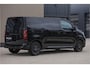 Opel Vivaro BLACK OPS | GEHEEL COMPLEET | HOUTEN VLOER EN WANDEN 3 PERSSONS | 2 DELIG ACHTER DEUREN | LADE SCHUIF BAK | 2.0D 180 PK S&S L2 H1 | FULL LED | SCHUIF DEUR | GEHEEL ZWART | MOOIE STOERE BUS |