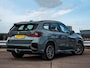 BMW iX1 eDrive20 67 kWh M Sport | SOH 100% | Trekhaak | Harman/Kardon | Keyless | LED | Camera | Navigatie | 18"