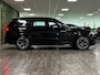 Volvo XC90 T8 AWD Recharge Ultra Dark | Full Option! | Bowers & Wilkins | Luchtvering | Stoelventilatie | Trekhaak | All Season banden | 360 Camera | Head-Up Display | Stoelmassage | 455pk | Adaptieve Cruise Control | Stoelverwarming voor+achter | Stuurwielverwarming | Schuifdak | 21 Inch | Full LED Matrix Meesturende koplampen | Gelamineerde/geluidwerende zijruiten | Pilot Assist | BLIS Dode Hoek Detectie | Alcantara hemelbekleding | Lederen handgrepen en zonnekleppen | Elektrische voorstoelen geheugen | Nappa Lederen bekleding | Zitting verlenging voorstoelen | Lederen Dashboard | Google Infotainment | Keyless Drive | Parkeersensoren voor+achter | Elektrisch bedienbare achterklep | Geïntegreerde zongordijnen achterportieren | Geïntegreerd kinderzitje achterin | Verlichte instaplijsten | 7-Persoons | 4-Zone Climate Control | DAB Radio | Apple Carplay/Android Auto | Alarm Klasse III | Draadloos telefoon opladen | Volvo On Call met mobiele App functie | Onyx Black Metallic |