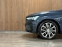 Volvo XC60 T8 AWD Recharge Plus Dark | Luchtvering | Trekhaak | 360° Camera | Harman Kardon | 455pk | Adaptieve Cruise Control | Stoelverwarming voor+achter | Stuurwielverwarming | Full LED Meesturende koplampen | Pilot Assist | BLIS Dode Hoek Detectie | Standkachel met Volvo On Call App | Elektrische voorstoelen geheugen | R-Design Contour stoelen met wit stiksel en bies | Zitting verlenging voorstoelen | Schuifdak | 20 Inch | Google Infotainment | Keyless Drive | Parkeersensoren voor+achter | Elektrisch bedienbare achterklep | DAB Radio | Apple Carplay/Android Auto | Draadloos telefoon opladen | Volvo On Call met mobiele App functie | Denim Blue Metallic |