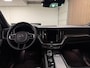 Volvo XC60 T8 AWD Recharge Plus Dark | Luchtvering | Trekhaak | 360° Camera | Harman Kardon | 455pk | Adaptieve Cruise Control | Stoelverwarming voor+achter | Stuurwielverwarming | Full LED Meesturende koplampen | Pilot Assist | BLIS Dode Hoek Detectie | Standkachel met Volvo On Call App | Elektrische voorstoelen geheugen | R-Design Contour stoelen met wit stiksel en bies | Zitting verlenging voorstoelen | Schuifdak | 20 Inch | Google Infotainment | Keyless Drive | Parkeersensoren voor+achter | Elektrisch bedienbare achterklep | DAB Radio | Apple Carplay/Android Auto | Draadloos telefoon opladen | Volvo On Call met mobiele App functie | Denim Blue Metallic |