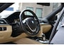 BMW 3-Serie 318i Luxury Edition Automaat | Sportstoelen | Achteruitrijcamera | Schuif/Kanteldak