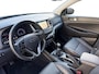 Hyundai Tucson 1.6 GDi Comfort | Elektrisch Verstelbare Stoelen | Navigatie | Bluetooth | Camera | Stoelverwarming | Cruise & Climate Control | Onderhoudshistorie | All Season Banden | 12 Maanden BOVAG Garantie