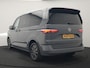 Volkswagen Multivan 1.4 eHybrid Bulli 7 Zits PHEV 218pk Dealer O.H | Trekhaak Af Fabriek | Adaptive Cruise | Camera | Sportstoelen & Stuur Verwarmd | Apple Carplay | BLIS | Navigatie | Virtual | DAB | 17"L.M | Plug In Hybrid |