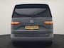 Volkswagen Multivan 1.4 eHybrid Bulli 7 Zits PHEV 218pk Dealer O.H | Trekhaak Af Fabriek | Adaptive Cruise | Camera | Sportstoelen & Stuur Verwarmd | Apple Carplay | BLIS | Navigatie | Virtual | DAB | 17"L.M | Plug In Hybrid |