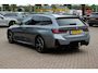 BMW 3-Serie Touring 330e / SoH 88,5% / Trekhaak / Panoramadak / Camera / Head-up / 18'' / Keyless / Laser LED / Sfeerverlichting / Stoelverwarming / Dodehoek / DAB / ACC