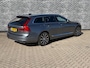 Volvo V90 2.0 T8 AWD Inscription | Plug-in Hybrid (PHEV) | Trekhaak | Luchtvering | Harman Kardon Audio | Nappaleder | Stoelventilatie | Stoelmassage | Stoelverwarming voor en achter | Achteruitrijcamera | Parkeersensoren | Keyless Entry | Elektrische Achterklep | Elektrisch Verstelbare Voorstoelen | Cruise Control Adaptief | BLIS | Navigatie