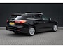Ford Focus Wagon 1.0 EcoBoost Titanium Automaat | Adaptieve cruise | Winter-pack | Afn. Trekhaak | Camera | Elec. achterklep | Dodehoek detectie | LED verlichting | Keyless entry | Privacy-glass