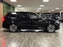Volvo XC90 T8 AWD Recharge Ulta Dark | Full Option! | Bowers & Wilkins | Luchtvering | Stoelventilatie | Trekhaak | 360 Camera | Head-Up Display | Stoelmassage | 455pk | Adaptieve Cruise Control | Stoelverwarming voor+achter | Stuurwielverwarming | Schuifdak | 22 Inch | Full LED Meesturende koplampen | Gelamineerde/geluidwerende zijruiten | Pilot Assist | BLIS Dode Hoek Detectie | Alcantara hemelbekleding | Lederen handgrepen en zonnekleppen | Elektrische voorstoelen geheugen | Nappa Lederen bekleding | Zitting verlenging voorstoelen | Lederen Dashboard | Google Infotainment | Keyless Drive | Parkeersensoren voor+achter | Privacy Glass | Elektrisch bedienbare achterklep | Geïntegreerde zongordijnen achterportieren | Geïntegreerd kinderzitje achterin | Verlichte instaplijsten | 7-Persoons | 4-Zone Climate Control | DAB Radio | Apple Carplay/Android Auto | Alarm Klasse III | Draadloos telefoon opladen | Volvo On Call met mobiele App functie | Onyx Black Metallic |