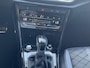 Volkswagen T-Roc 1.5 TSI 150pk DSG R-Line Navigatie Apple Carplay / Android Auto Parkeersensoren Afneembare trekhaak Park Assist Adaptive Cruise Control Elektrische achterklep Stoel- en stuurverwarming Climate Control Ledverlichting Virtual Cockpit