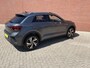 Volkswagen T-Roc 1.5 TSI 150pk DSG R-Line Navigatie Apple Carplay / Android Auto Parkeersensoren Afneembare trekhaak Park Assist Adaptive Cruise Control Elektrische achterklep Stoel- en stuurverwarming Climate Control Ledverlichting Virtual Cockpit