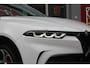 Alfa Romeo Tonale 1.3T 280PK PHEV VELOCE | PANORAMISCH SCHUIF/KANTEL DAK | PREMIUM PACK: LEDEREN BEKLEDING/GEVENTILEERDE VOORSTOELEN/4-VOUDIG ELEKTRISCH VERSTELBARE LENDESTEUN VOORSTOELEN/HOOGGLANS ZWARTE RAAMOMLIJSTING/AMBIENT LIGHTING | TECHNOLOGY PACK: PARKEERWAARSCHUWING VOOR EN ACHTER/ACHTERUITRIJ CAMERA/AUTONOMOUS DRIVING LEVEL 2: ADAPTIVE CRUISE CONTROL/LANE CENTERING ASSIST/TRAFFIC JAM ASSIST/AUTOMATISCH DIMMENDE BUITENSPIEGELS | WINTERPACK: STOELVERWARMING VOOR/STUURVERWARMING/VERWARMBARE RUITENSPROEIERS | HARMAN KARDON SOUND SYSTEM | 20" LICHTMETALEN VELGEN "GRAPHITE GREY" | DRAADLOZE TELEFOONLADER | NAVIGATIE | DRAADLOZE APPLE CARPLAY/ANDROID AUTO | FULL LED MATRIX KOPLAMPEN |