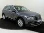 Volkswagen Tiguan 1.4 TSI Elegance eHybrid | SoH 97% | Trekhaak | Adaptieve demping | Matrix LED verlichting | Adaptieve cruise control | Dodehoekdetectie | Parkeersensoren | Stoel- en stuurwielverwarming |