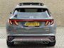 Hyundai Tucson 1.6 T-GDI PHEV 265pk N Line Sky 4WD | Panoramadak | 360 camera | Adaptieve cruise & lane assist | Leder/suede bekleding | Stoelverwarming&ventilatie | Stuurverwarming | Memory | Elektrische achterklep | Apple CarPlay | Navigatie | Full-LED | DAB | Keyless | 19 inch velgen | Volledig onderhouden