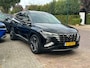 Hyundai Tucson 1.6 T-GDi HEV 230PK Premium Automaat + 19"/ Navi/ Clima/ Ad.Cruise/ Leder/ Winterpakket/ Camera/ Trekhaak/ NL auto