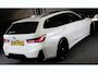 BMW 3-Serie Touring 320e M Line / Head Up / Memory / Navi / Camera / Acc / F1 / Open Panoramadak / Led / Pdc / 19 Inch
