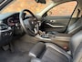 BMW 3-Serie Touring 330i High Executive|Trekhaak|Camera|PDC