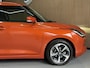 Suzuki Swift 1.2 Comfort + Hyb | Aut | Navi | 16" | Carplay | Stoelverwarming | ACC | Dodehoek | 100% Suzuki Onderhouden!