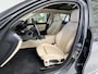 BMW 3-Serie Touring 330e Business Edition Plus | Leder | Achteruitrijcamera | Panoramadak | Stoelverwarming |