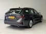 BMW 3-Serie Touring 330e Business Edition Plus | Leder | Achteruitrijcamera | Panoramadak | Stoelverwarming |