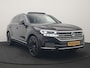 Volkswagen Touareg 3.0 TSi eHybrid 4MOTION PHEV 381pk Dealer O.H | Luchtvering | Trekhaak Af Fabriek | Panodak | Adaptive Cruise | Matrix LED | Lederen Sportstoelen Memory & Verwarmd | Keyless | Apple Carplay | Virtual | Navigatie | DAB | 21"L.M | Plug In Hybrid |