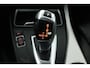 BMW 1-Serie 118i Edition M Sport Shadow Executive (TREKHAAK, CRUISE CONTROL, NAVIGATIE, DEALER ONDERHOUDEN)