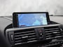 BMW 1-Serie M135 M135i xDrive High Executive Automaat 320Pk (GROOT NAVI, SCHUIFDAK, ALCANTARA STUUR, AKRAPOVIC UITLAATSYSTEEM, LEDER, NIEUWE APK)