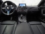 BMW 1-Serie M135 M135i xDrive High Executive Automaat 320Pk (GROOT NAVI, SCHUIFDAK, ALCANTARA STUUR, AKRAPOVIC UITLAATSYSTEEM, LEDER, NIEUWE APK)