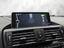 BMW 1-Serie M135 M135i xDrive High Executive Automaat 320Pk (GROOT NAVI, SCHUIFDAK, ALCANTARA STUUR, AKRAPOVIC UITLAATSYSTEEM, LEDER, NIEUWE APK)