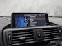 BMW 1-Serie M135 M135i xDrive High Executive Automaat 320Pk (GROOT NAVI, SCHUIFDAK, ALCANTARA STUUR, AKRAPOVIC UITLAATSYSTEEM, LEDER, NIEUWE APK)
