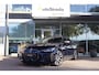 BMW i4 (g26) M50 544pk M-Sport SoH 94% | Tansanietblau | Pano | 360 CAM | Laser | Harman/Kardon | Trekhaak |
