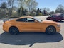 Ford Mustang Fastback 2.3 EcoBoost 289pk | Custom Pack Black | Lederen bekleding | Navigatie full map | Voorstoelen verwarmd en geventileerd | Audio installatie premium | Twister Orange