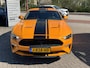 Ford Mustang Fastback 2.3 EcoBoost 289pk | Custom Pack Black | Lederen bekleding | Navigatie full map | Voorstoelen verwarmd en geventileerd | Audio installatie premium | Twister Orange