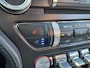 Ford Mustang Fastback 2.3 EcoBoost 289pk | Custom Pack Black | Lederen bekleding | Navigatie full map | Voorstoelen verwarmd en geventileerd | Audio installatie premium | Twister Orange