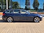 BMW 3-Serie Touring 320i High Executive / Winterset / stoelverwarming