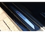 BMW 1-Serie M140i xDrive Centennial High Executive Alcantara|CarPlay
