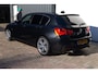 BMW 1-Serie M140i xDrive Centennial High Executive Alcantara|CarPlay