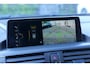 BMW 1-Serie M140i xDrive Centennial High Executive Alcantara|CarPlay