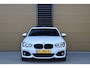 BMW 1-Serie 118i Edition M Sport Shadow High Exe * Schuifdak * 19'' Performance Wielen * Lichtpakket * Privacy glas *