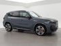 BMW iX1 eDrive20 67 kWh M SPORT EDITION *NIEUW* + PANORAMA | TREKHAAK | CAMERA | ADAPTIVE CRUISE | 19 INCH