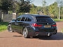 BMW 5-Serie Touring 530e Business Edition Plus | M-Pakket | Panoramadak | Trekhaak | Camera | Sfeerverlichting | NL-Auto |