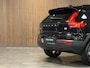Volvo XC40 T4 Recharge R-Design T4 Recharge R-Design | Bestuurdersstoel elektrisch geheugen | Adaptieve Cruise Control | Stoel en Stuurwielverwarming | Parkeercamera | Standkachel met Volvo On Call App | Pilot Assist | BLIS Dode Hoek Detectie | Parkeersensoren voor+achter | Passagiersstoel elektrisch | 20 Inch | Zitting velenging voorstoelen | Keyless Drive | Climate Control L+R | Regensensor | Privacy Glass | Automatisch dimmende binnen en buitenspiegels | Elektrisch bedienbare achterklep | DAB Radio | Apple Carplay/Android Auto | Volvo On Call met mobiele App functie | Onyx Black Metallic |
